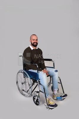 Disabled guy sitting in a wheelchair