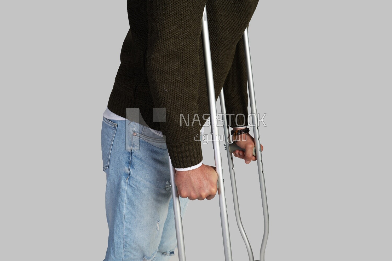 Man with crutch