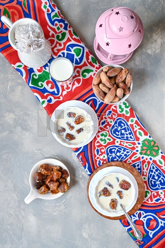 Two bowls of dates milk, healthy and useful juice, ramadan juice