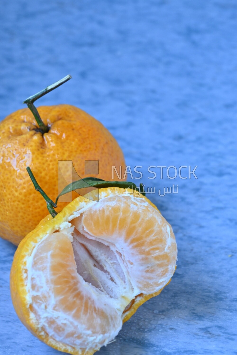 Tangerine on a blue background