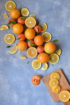 Oranges with orange slices on the table​