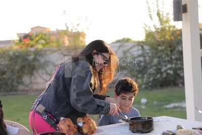 a family eating in the garden