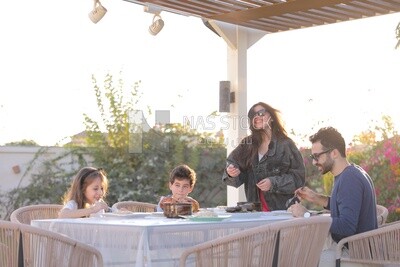 a family eating in the garden