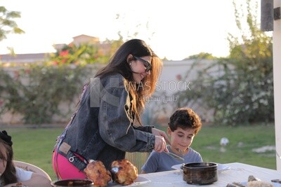 a family eating in the garden