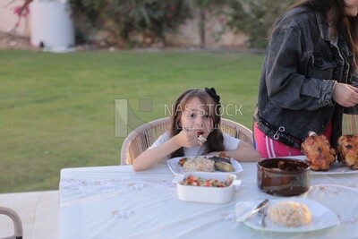 a family eating in the garden