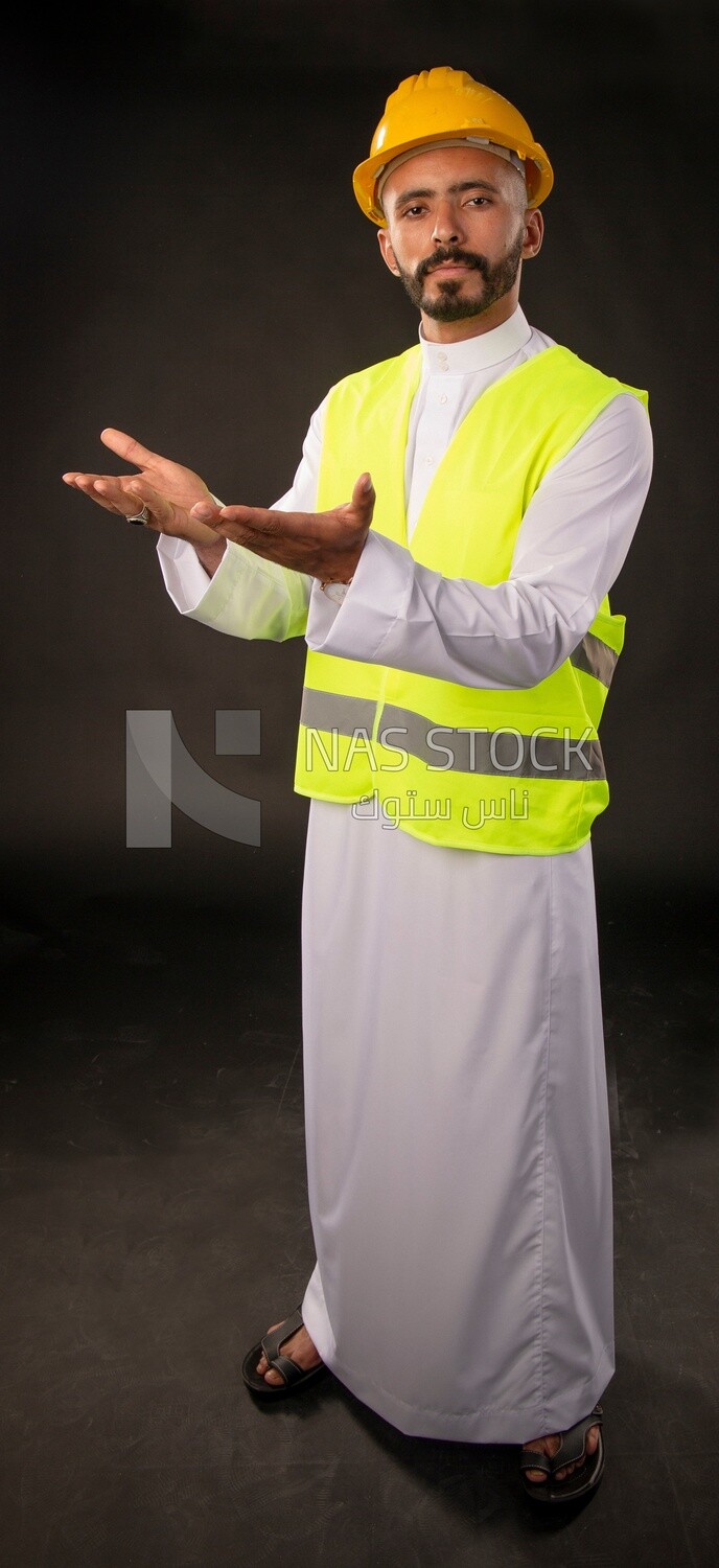 A gulf engineer man on a black background