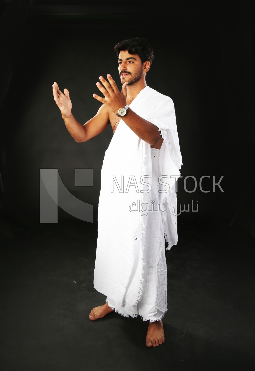 A man wearing an ihram dress