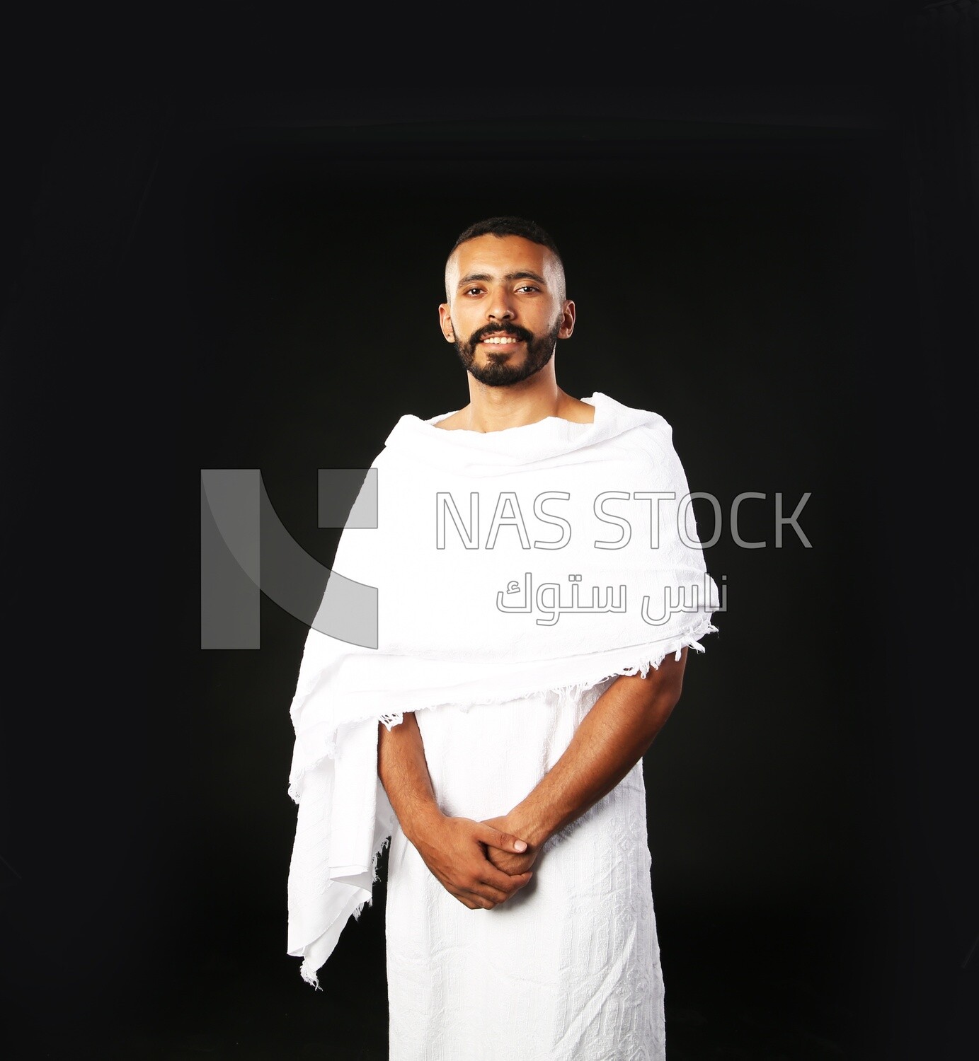 A man wearing an ihram dress