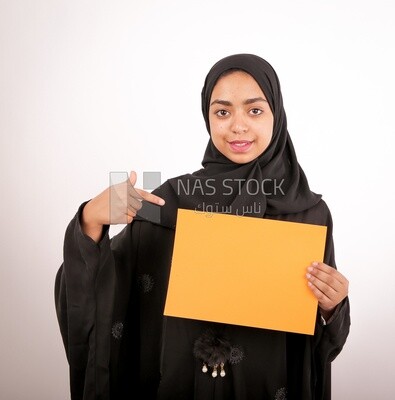 A woman with a black abaya