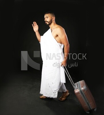 A man wearing an ihram dress