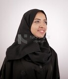 A woman with a black abaya