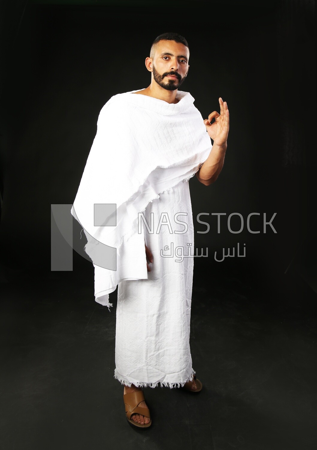 A man wearing an ihram dress