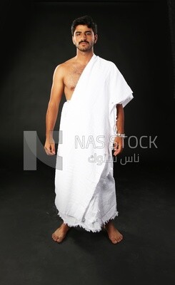 A man wearing an ihram dress