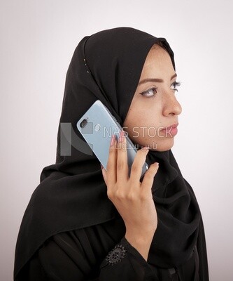 A woman with a black abaya