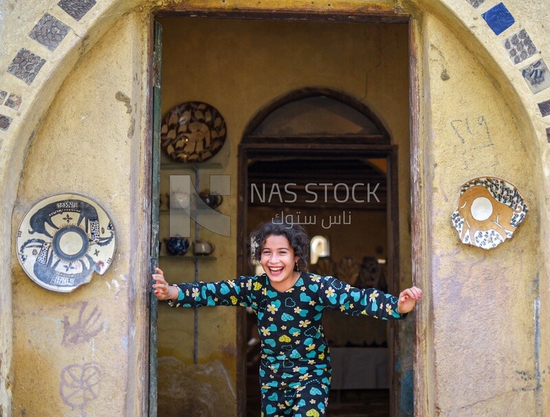 Girl at a pottery shop