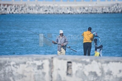 Couple and a fisherman