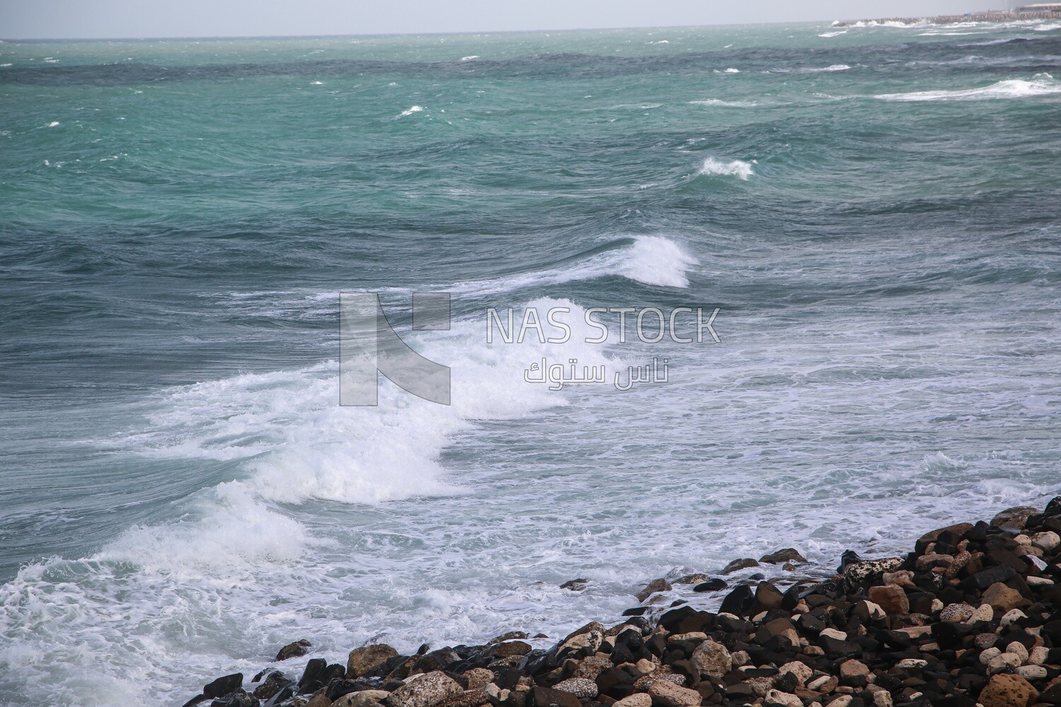 Waves hitting rocks