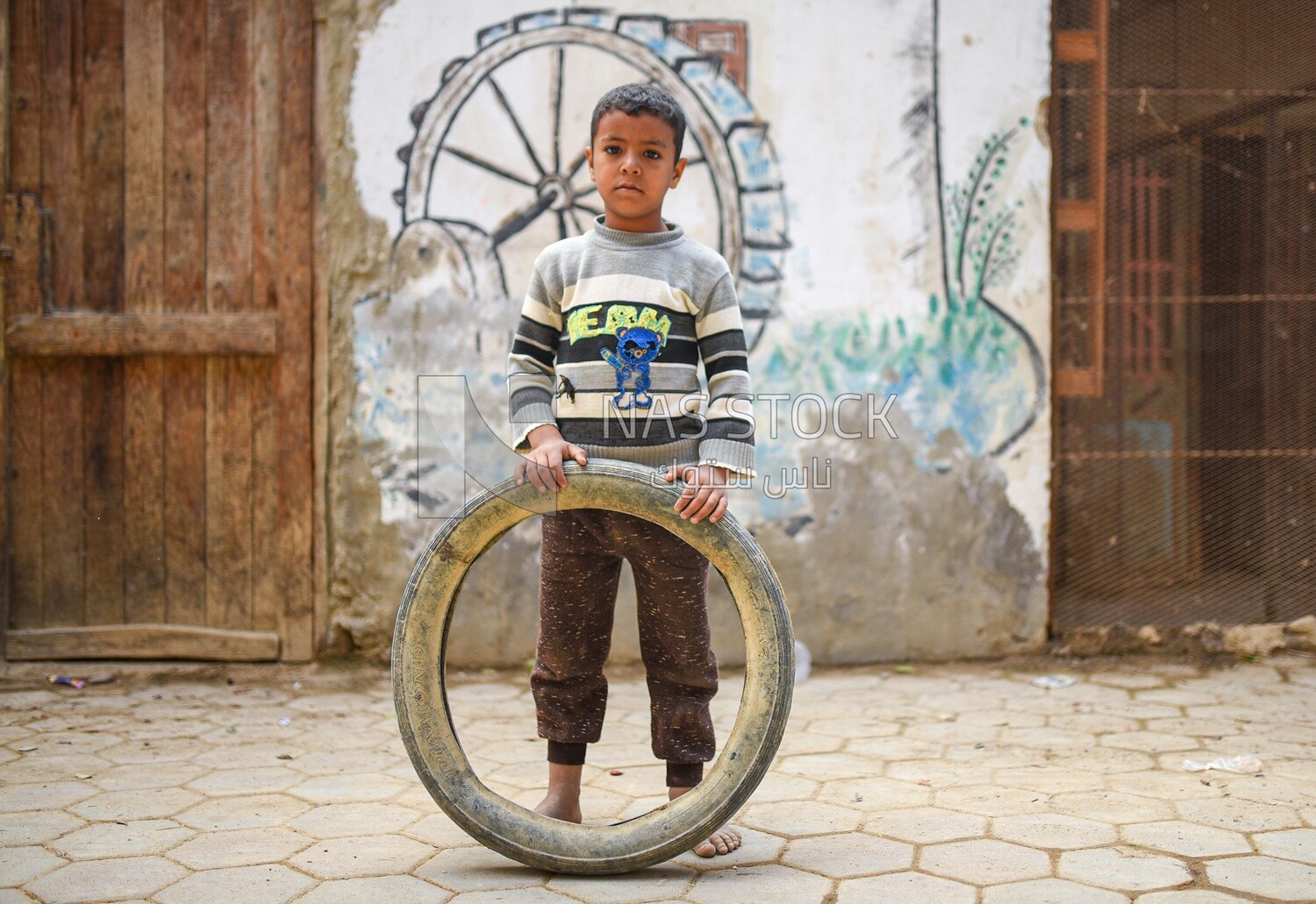 Boy with tire