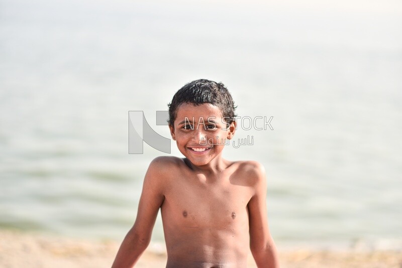 Boy preparing to swim
