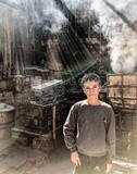 Boy with iron boxes