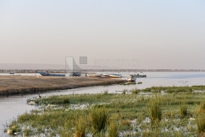 Lake with wooden boats