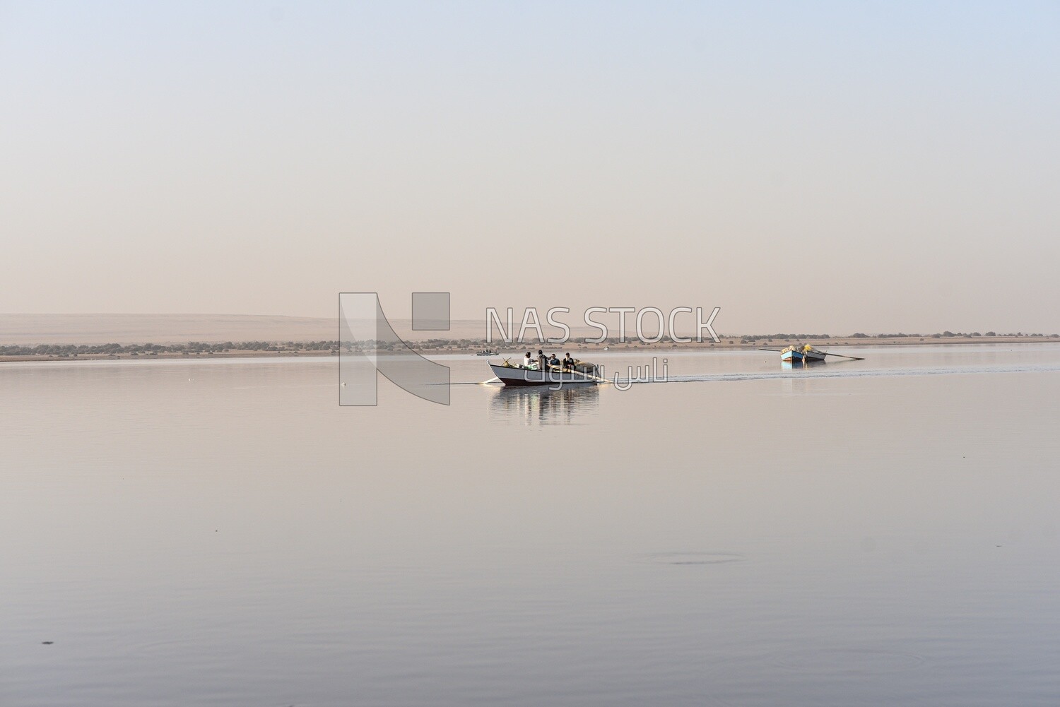 Freshwater lake with wooden boats