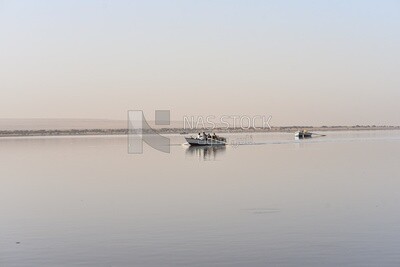 Freshwater lake with wooden boats