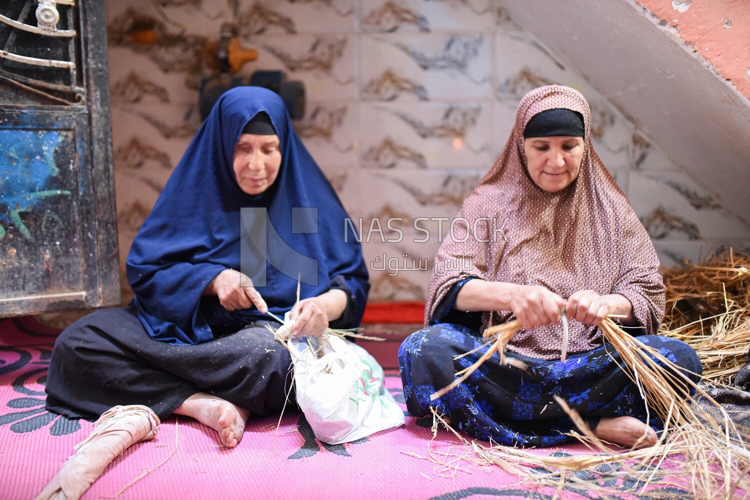 Women shaping wicker