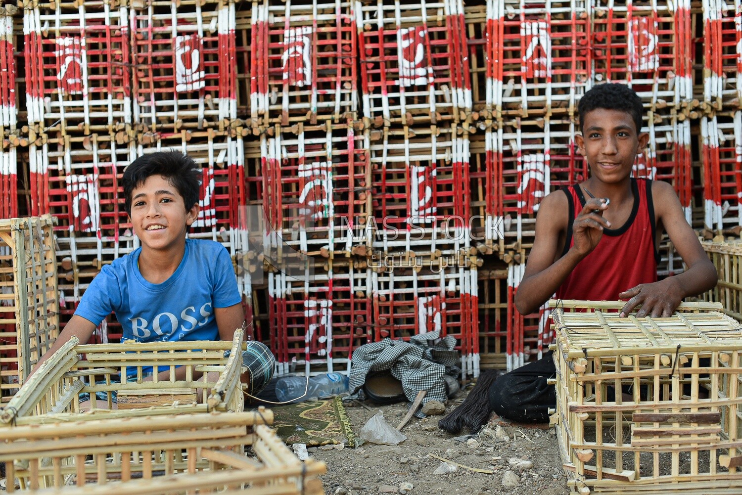 Egyptian children learning to make cages