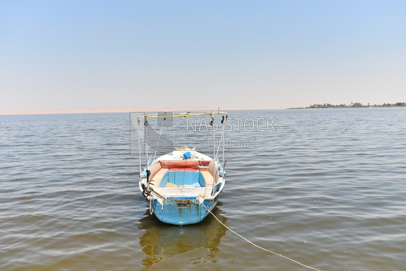 Small boat moored in a lake in Egypt