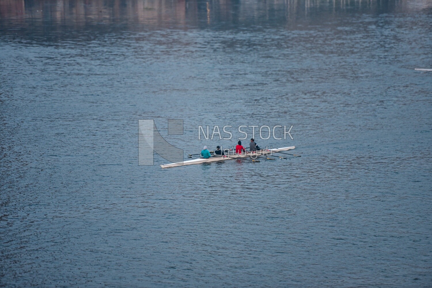 Girls rowing in the Nile River