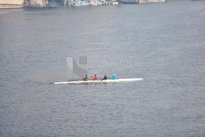 Girls rowing in the Nile River