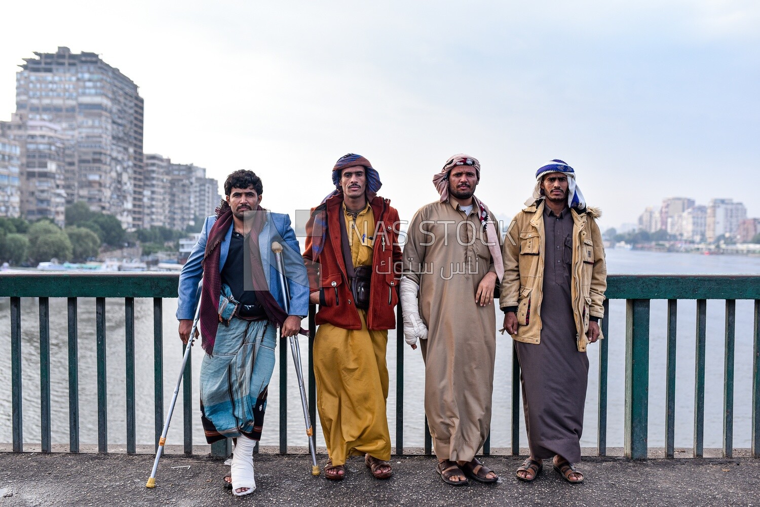 Men take a photo on the Nile Corniche
