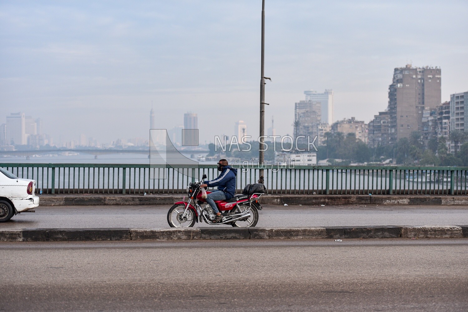 Young man driving a motorcycle