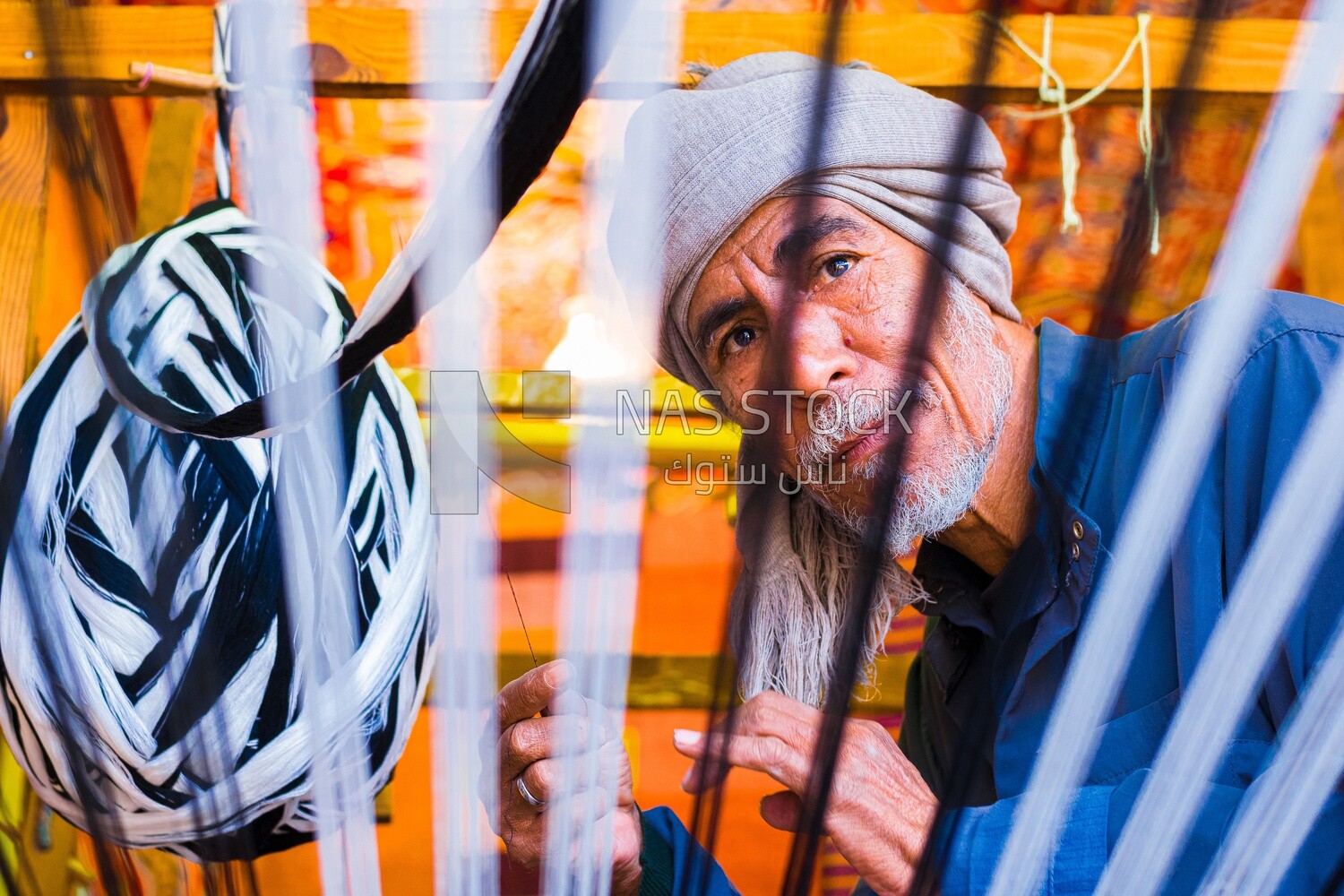 Close up photo of an old man, work, summer
