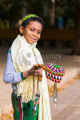 Close up photo of a boy looking away, random