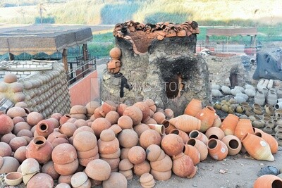 A scene of a collection of pottery and a pottery kiln