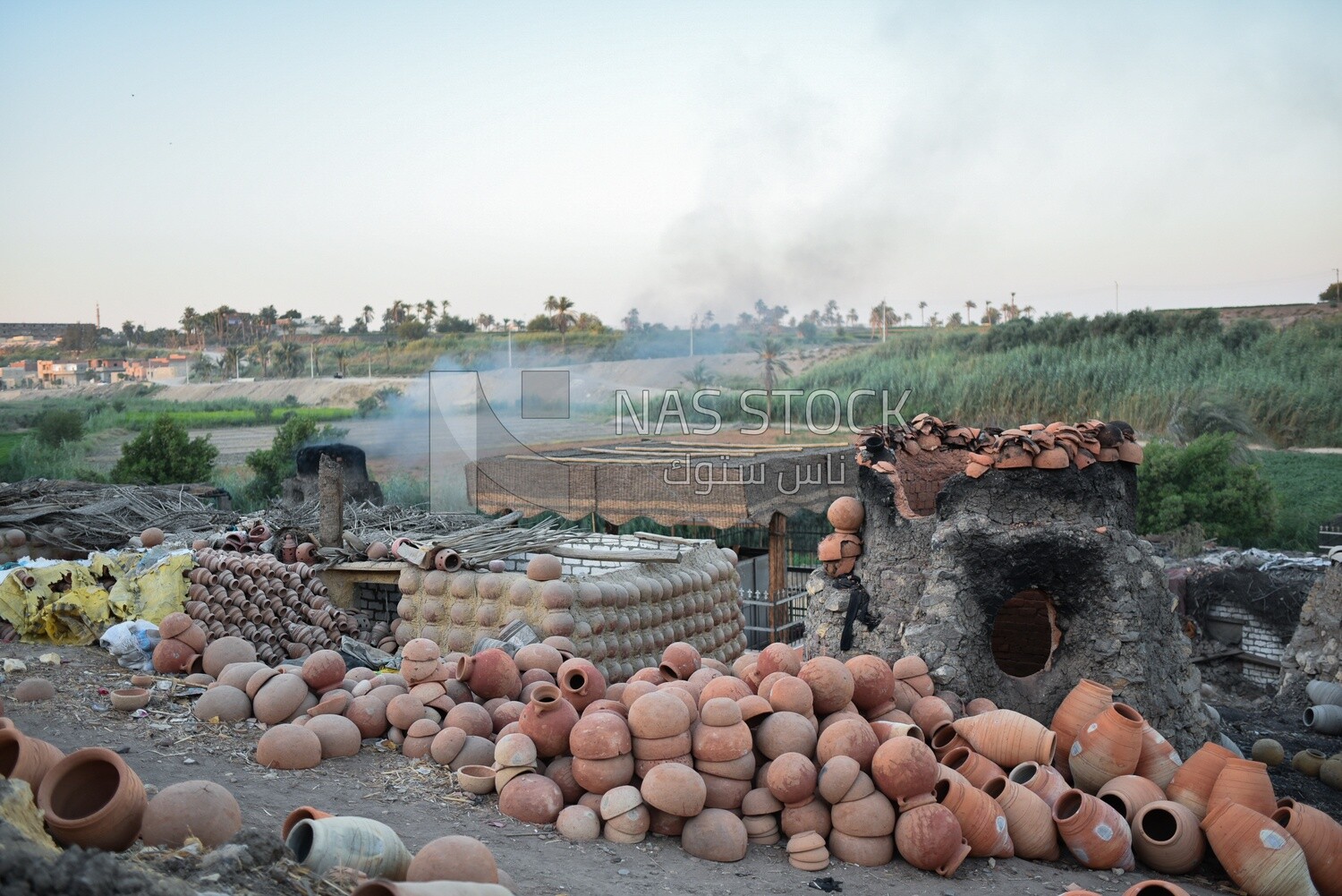 A scene of a collection of pottery and a pottery kiln
