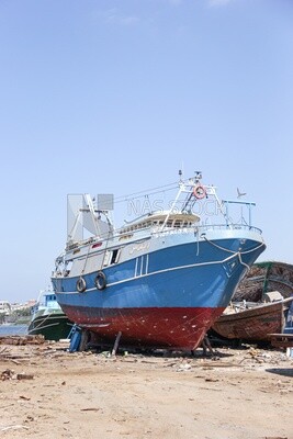 Old ships moored to the beach