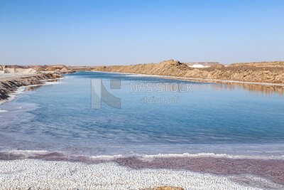 Salt lake in Siwa with a beach of salt crystals, Egypt