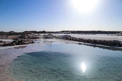 Salt lake in Siwa with a beach of salt crystals, Egypt