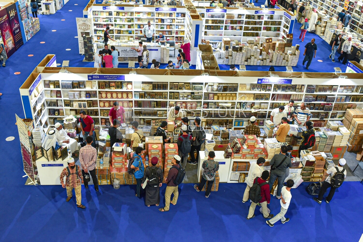 People visiting the booth of Islamic books at the Book Fair