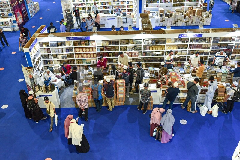 People visiting the booth of Islamic books at the Book Fair
