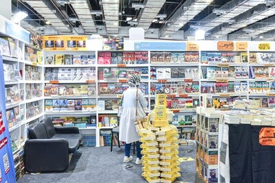 Girl wanders into a Cairo Book Fair