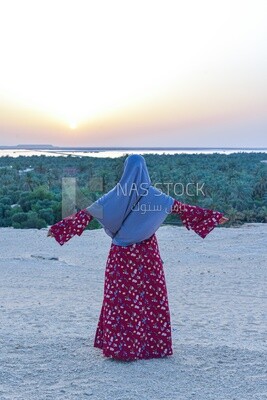 An Arab girl enjoying the natural scenery in Siwa Oasis