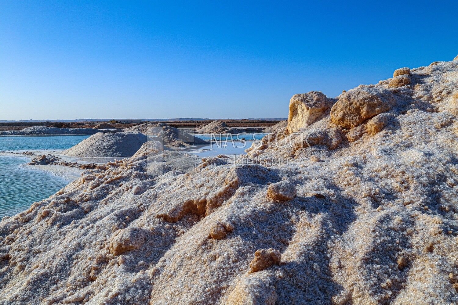 Beach made of salt crystals in Salt Lake, Siwa Oasis, Egypt