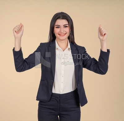 Photo of a businesswoman standing and looking happy, meeting at the workplace, discussing work tasks, taking notes on the board