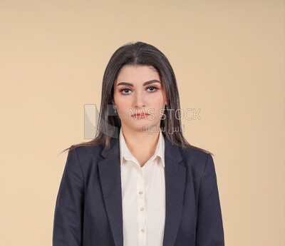 Portrait of a businesswoman standing, meeting at the workplace, discussing work tasks, taking notes on the board
