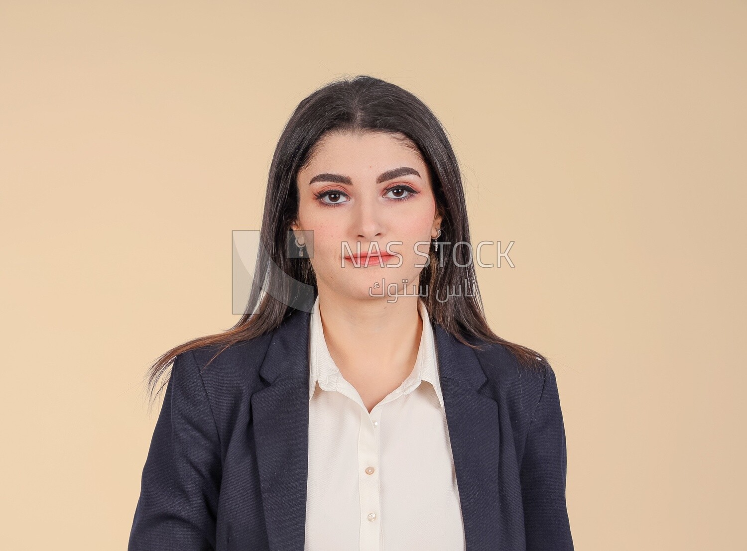Portrait of a businesswoman standing, meeting at the workplace, discussing work tasks, taking notes on the board