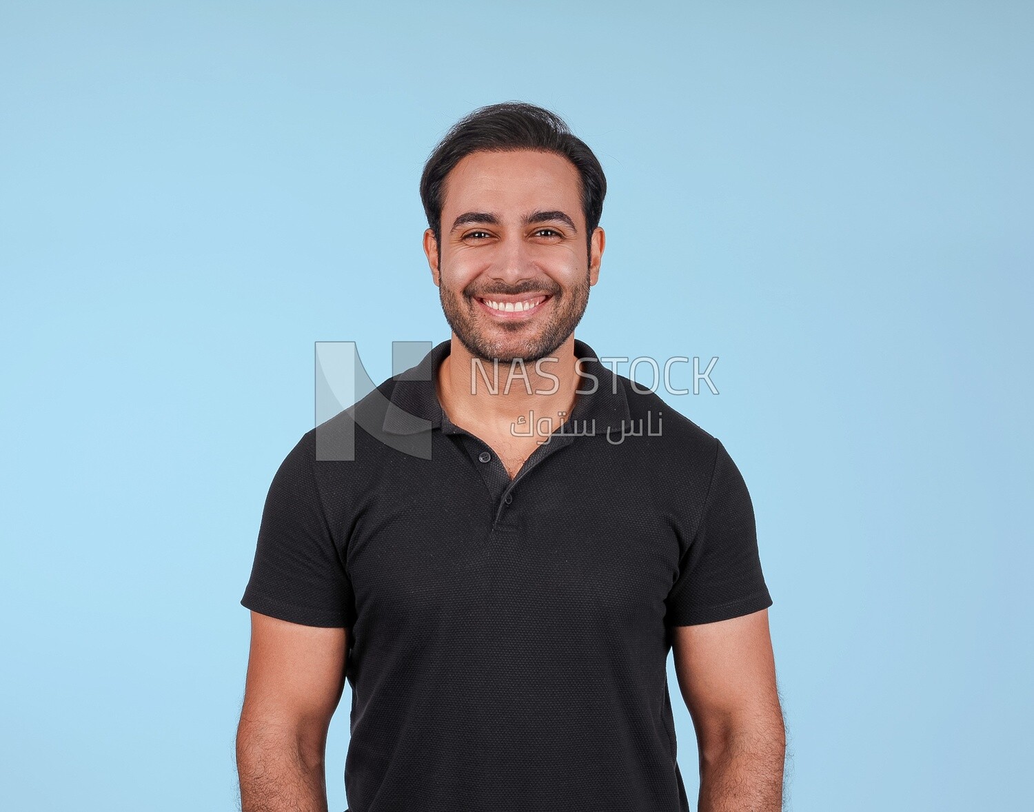 Portrait Of Handsome man Standing, Smiling Man, Wearing Casual Clothes Posing In a Light Room Interior, Smiling At the Camera